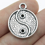 silver color yin and yang jewel