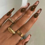 brown yin yang nails