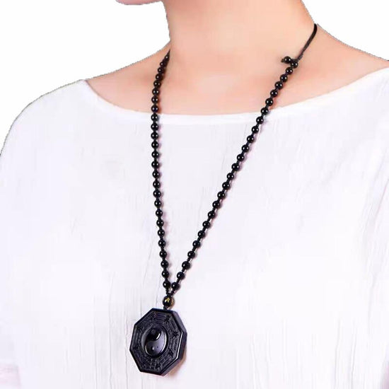 obsidian yin and yang pendant