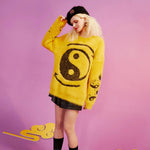 yin yang yellow sweater